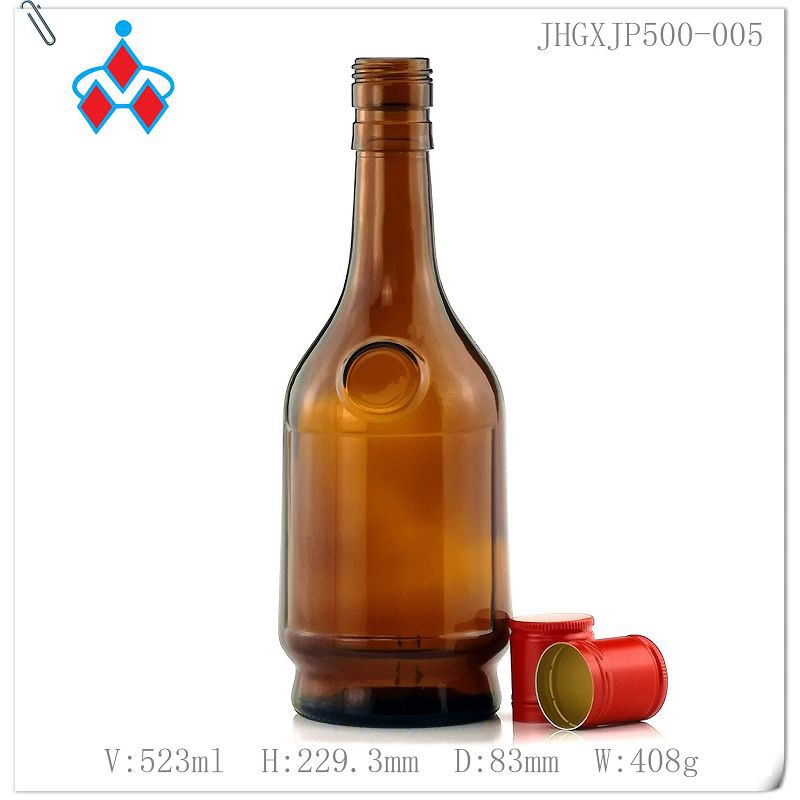 بطری شیشه ای قهوه ای مشروب قدیمی
